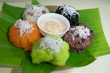 Colorful of sticky rice or Xoi on banana leaf with sesame salt. Famous street food for breakfast or fast foot in Vietnam. traditional foot. Royalty high quality free stock image. beautiful sticky rice