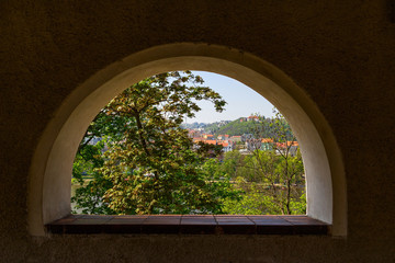 View through an open window from Vysehrad castle in Prague