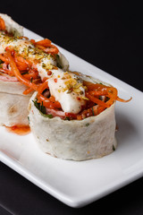 Rolls with pita and ham on white plate