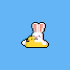 Pixel art cartoon rabbit on the duck swim ring.8bit.