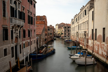 Fototapeta na wymiar Beautiful venetian street in summer day, in Venice, Italy