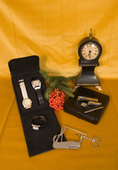 Table clock, multi-function pocket knife, wristwatch and various quality personal items.