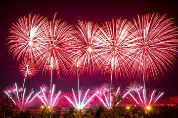 Red Fireworks light up the sky