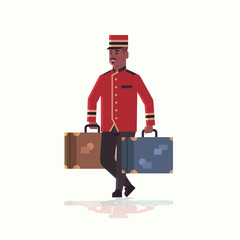 bell boy carrying suitcases service concept african american bellman holding luggage male hotel worker in uniform full length flat