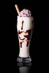 white chocolate milkshake on black background