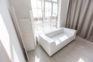 Horizontal view of white living room design