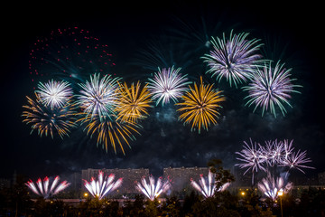 Red White Green Fireworks light up the sky