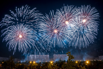 Fototapeta na wymiar Blue Fireworks light up the sky