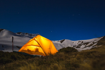 Tent near Muhu Pass, Karachay-Cherkessia. Caucasus Mountains at night.