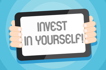 Text sign showing Invest In Yourself. Business photo showcasing learn new things or materials thus making your lot better Color Tablet Smartphone with Blank Screen Handheld from the Back of Gadget