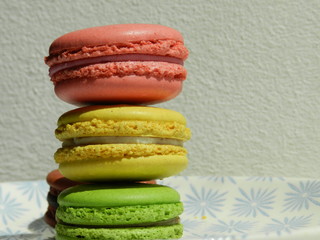 colorful macaroons on white background