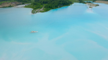 Artificial lake for discharging chemical waste from a chemical plant. Environmental pollution. Ecological catastrophy. Aerial shot