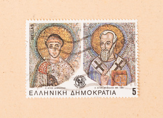 GREECE - CIRCA 1985: A stamp printed in Greece shows two holy individuals, circa 1985