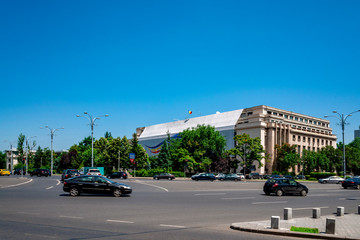 Fototapeta na wymiar Landmark and administrative building concept theme with The Victoria Palace (Palatul Victoriei) the headquarters of the Romanian Government in Bucharest, Romania on a cloudless and sunny summer day