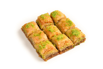 Pistachio baklava on a white background. Dessert.