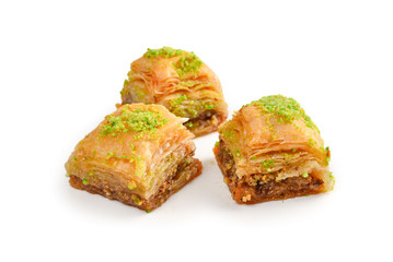 Pistachio baklava on a white background. Dessert.