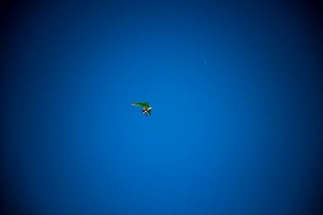 Obraz na płótnie Canvas Motorized glider in blue sky