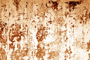 Obraz premium Сraked weathered cement wall texture in orange tone.