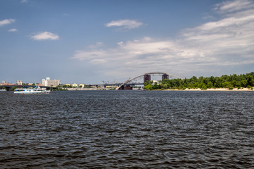 Fototapeta na wymiar Walking throught the Dnipro river in Kyiv city, Ukraine. Landscapes and views from the boat