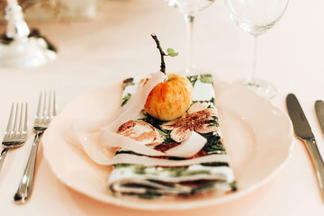 Romantic table setting decorated with apple.