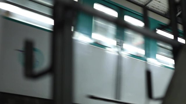 Paris, France - April 5, 2019: Metro starting in tight shot low angle.