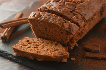 Slice of sponge chocolate cake. Chocolate, homemade dessert.