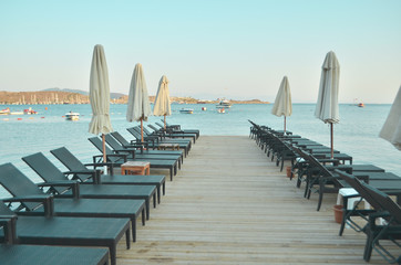 Beach Chairs on beautiful island, evening. - Image