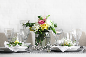 Obraz na płótnie Canvas Beautiful table setting with fresh freesia flowers
