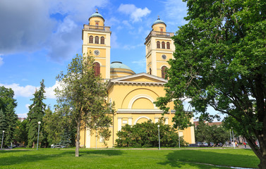 Fototapeta na wymiar Eger, Hungary. Cathedral Basilica of St. John the Apostle. Church from 1837 with three naves. Dome of cathedral is lavishly decorated, a height of 40 meters. In chorus are the two bell towers 