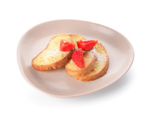 Plate with tasty French toasts and strawberry on white background