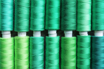 Many sewing threads as background