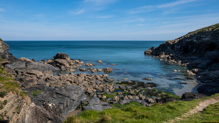 Fototapeta na wymiar Cornwall rocky cove coastline England