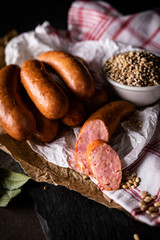 Smoked thin sausage. Traditional cuisine, meat composition