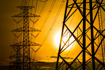 High voltage electric post with sunlight in The morning, Chiangmai Thailand