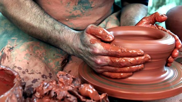 Medieval Potter using potters wheel and hands crafting earthenworks clay molds porcelains ceramics Producing cooking pots, storage containers decorative objects guild member
Medieval Craft Ocupation