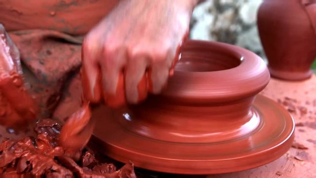 Medieval Potter using potters wheel and hands crafting earthenworks clay molds porcelains ceramics Producing cooking pots, storage containers decorative objects guild member
Medieval Craft Ocupation