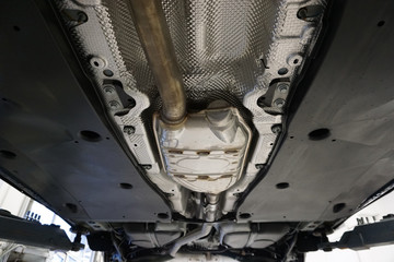 Sharp technical photograph.  The design and elements of a modern car. Details of the exhaust...