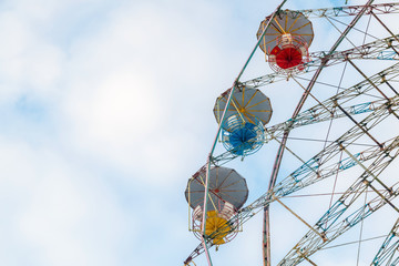 Vintage ferris wheel. Colourful old carousel at circus with copy