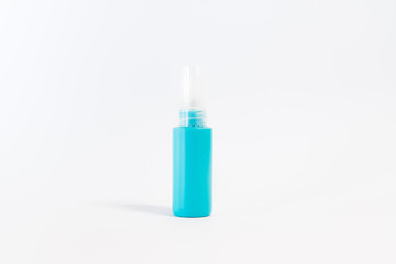 Blank plastic spray bottle on white background. Copy space for t