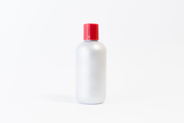 Blank plastic shampoo bottle on white background. Copy space for