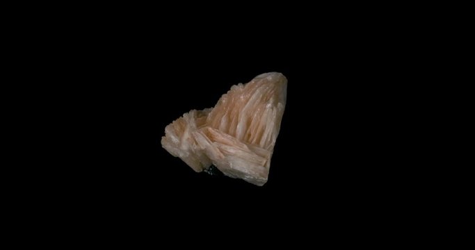 Pink Baryte Mineral Turning on Black