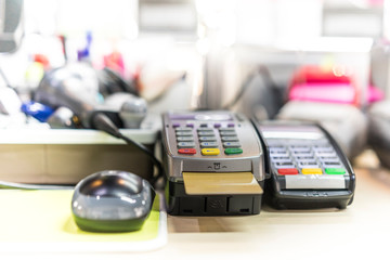 Credit Card reader machine on cashier desk
