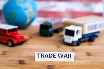 Trade War shipping concept with trucks and USA and China flag in background