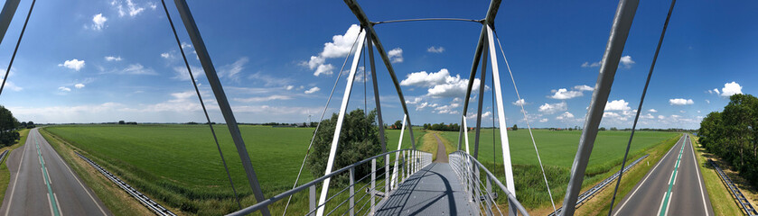 Panorama from a bridge over a road near Wommels