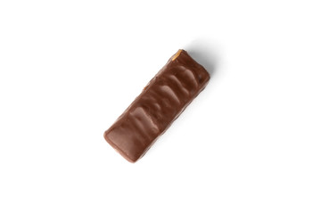 Chocolate sweet with caramel and peanut isolated on white background.