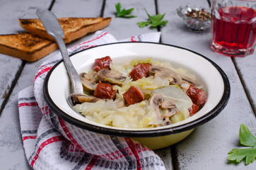 Stewed vegetables with sausages