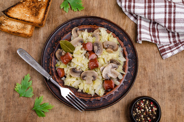 Stewed vegetables with sausages