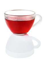 tea in transparent cup isolated on white with reflection