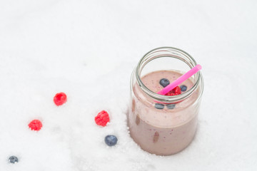 Fresh Smoothie beverage made from pureed berry raw fruit. Cold ice cream with frozen yogurt for your healthfulness.
