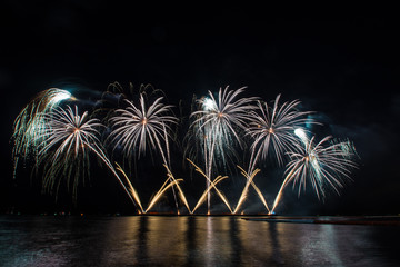 Beautiful firework display for celebration over the sea